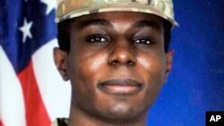 This family photo shows a portrait of American soldier Travis King displayed at the home of his grandfather Carl Gates, Wednesday, July 19, 2023, in Kenosha, Wis. (Family Photo via AP)