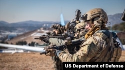 U.S. and South Korea soldiers train Dec. 22, 2023, at the Republic of Korea Special Warfare School training range near Icheon, South Korea.