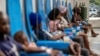 Patients receive treatment for cholera at the Gheskio Center Hospital supported by UNICEF in Port-au-Prince, Haiti, Oct. 14, 2022.