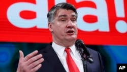 Zoran Milanovic, the liberal opposition candidate addresses to supporters after his headquarters claimed victory in a presidential elections in Zagreb, Croatia, Sunday, Jan. 5, 2020. The exit poll carried by public broadcaster HRT and conducted by…