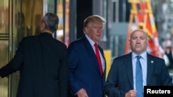 FILE PHOTO: Former U.S. President Donald Trump departs Trump Tower for a deposition two days after FBI agents raided his Mar-a-Lago Palm Beach home