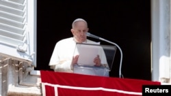 Pope Francis leads the Angelus prayer at the Vatican