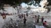 Aftermath of an Israeli strike on a house, in Maghazi refugee camp in the central Gaza Strip