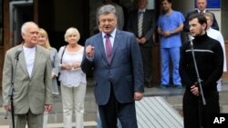 Юрий Солошенко, президент Петр Порошенко и Геннадий Афанасьев