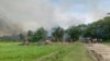 Smoke are seen here in the sky above a village in Yathay Taung Township. Aug. 27th, 2017.