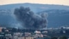 Smoke rises during Israeli strikes on villages overlooking the souther Lebanese city of Tyre on October 11, 2024.