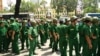 Chinese Tourists wear U shaped T-Shirts claiming China’s sovereigty of South China Sea at Vietnamese airport