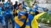 Women dance during a cultural presentation during the official opening of the Golden Square Freedom Park in Bridgetown, Barbados, on Nov. 27, 2021.