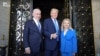 This still image taken from an Israeli Government Press Office video shows Israeli Prime Minister Benjamin Netanyahu (L) and his wife Sara (R) being welcomed by former US President Donald Trump at the Mar-a-Lago Club in West Palm Beach, Florida, on July 2