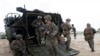 FILE - U.S. soldiers land with an amphibious assault vehicle on the beachhead during U.S.-Thai "Cobra Gold" joint military exercises on Hat Yao beach in Chonburi province, eastern Thailand, Feb. 28, 2020.