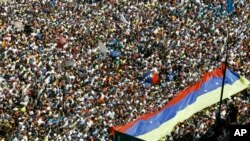 Manifestan venezuelyen ki pran lari nan Karakas.