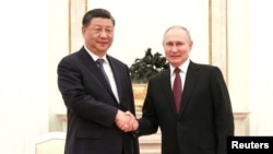 Russia's Putin holds talks with China's Xi in Moscow